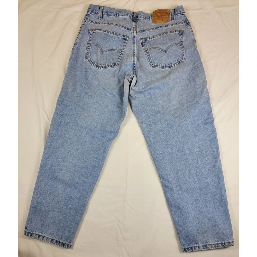 Vintage Levi's 560 Mens Jeans Light Wash Loose Fit Tapered‎ Leg W37 L30 USA